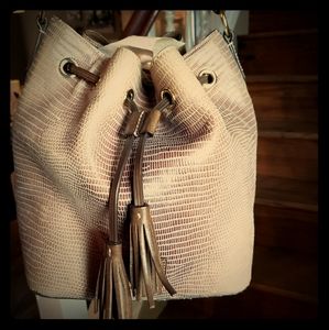 Dooney and Bourke drawstring bucket bag.